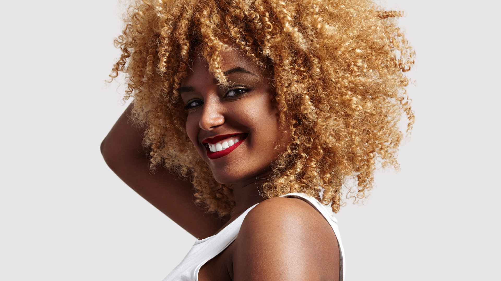 How to Moisturise Dry Hair: Female with bleached afro hair