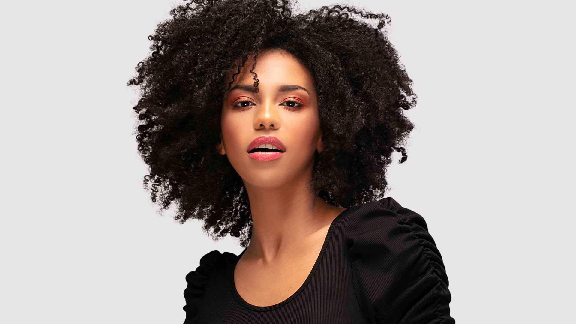 Deep Conditioning Hair Mask | female with frizz-free curly afro hair