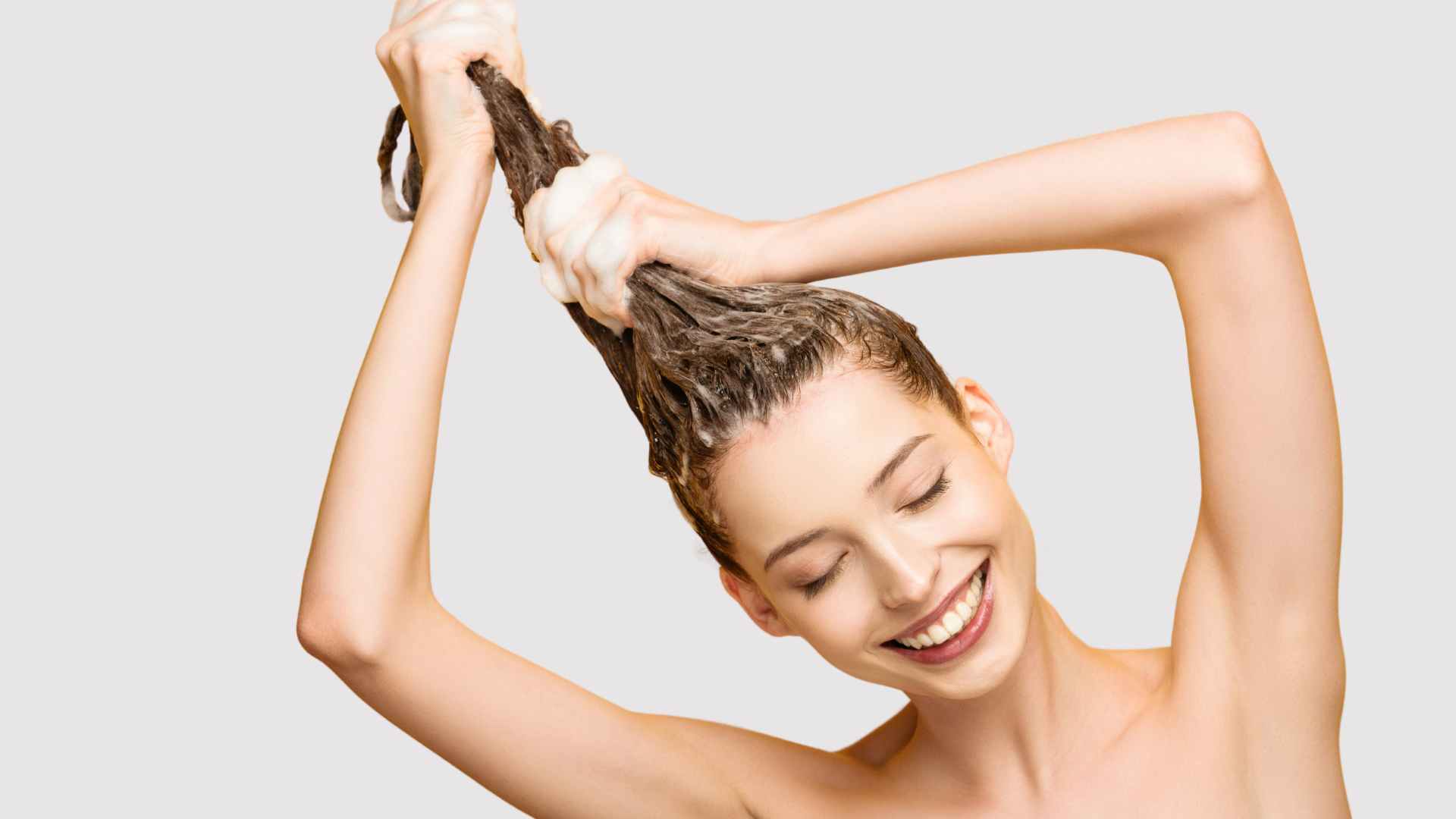 Long Hair Tips | Female laughing washing long hair