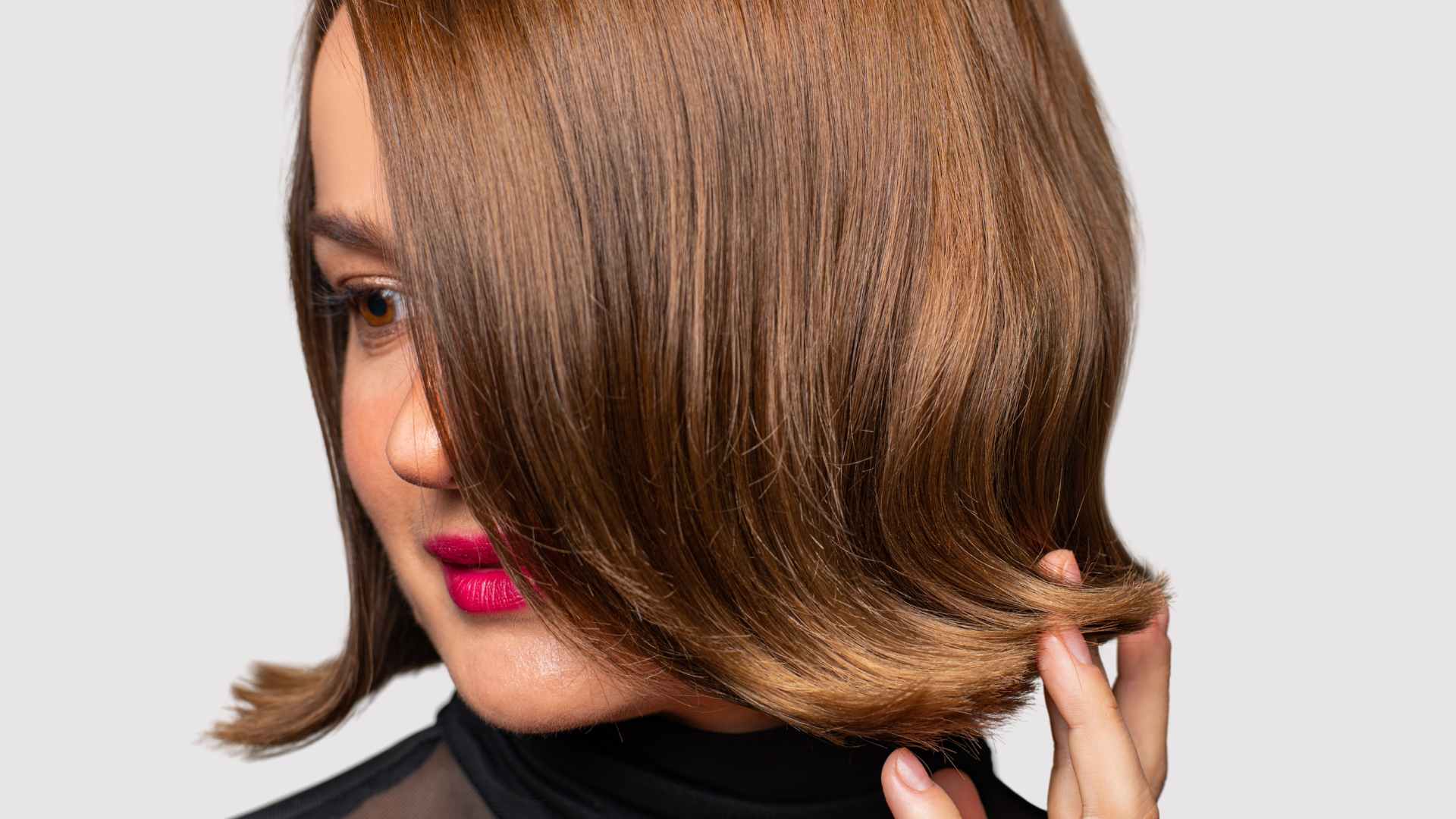 Female with short bob hairstyle with volume at ends of hair