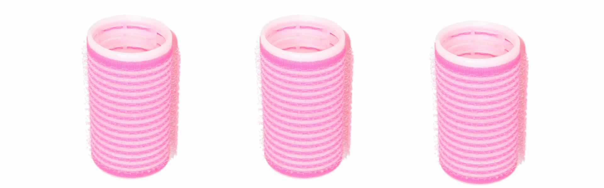 3 pink velcro rollers in a row