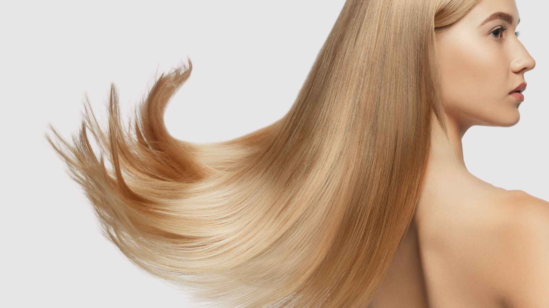 female with flowing long blonde fine hair, free from damage