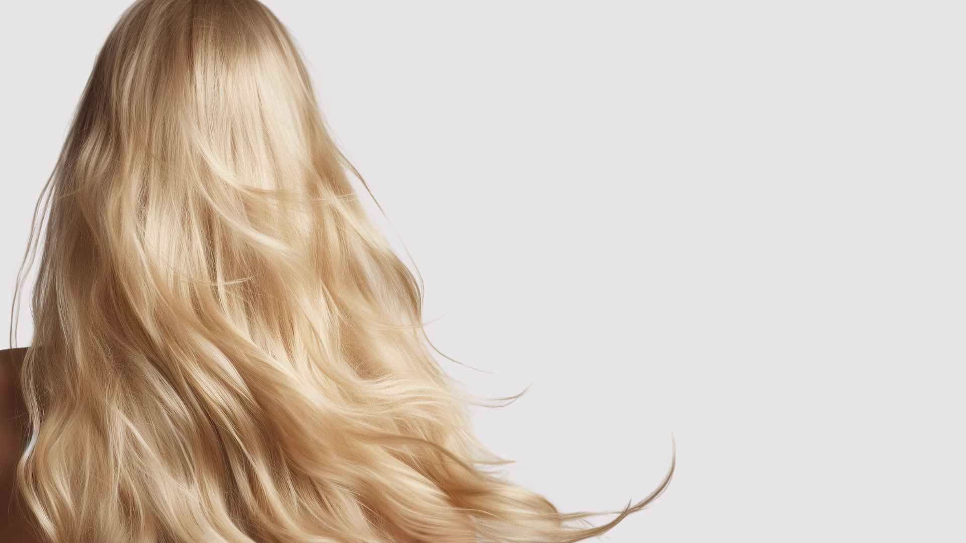 Split Ends: Female with long blonde hair, back to camera